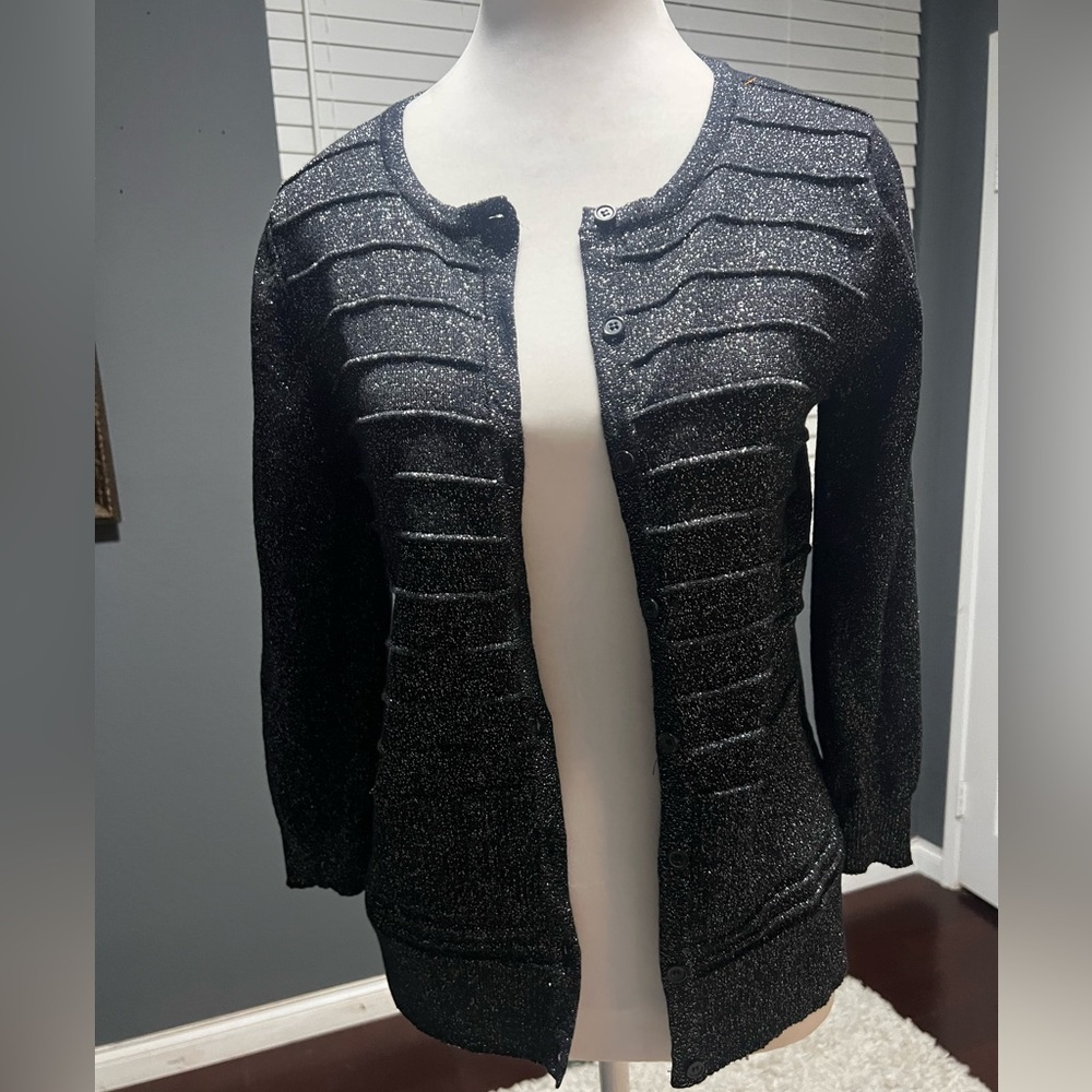 - Black and silver metallic cardigan with 3/4 sleeves. 
NWT. Size Small